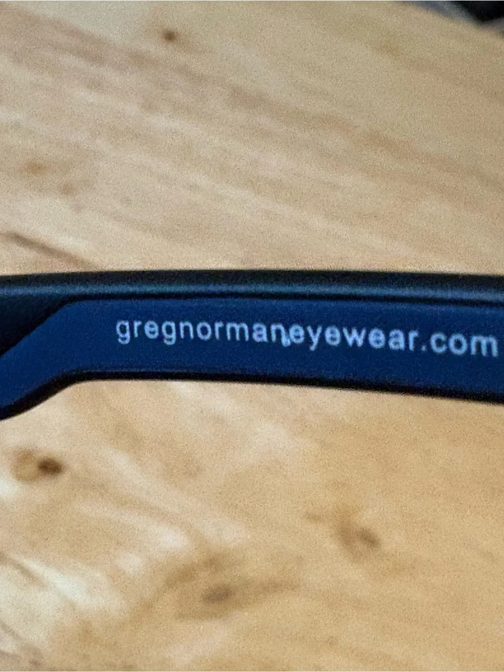 BN Greg Norman wrap-style sunglasses black anti-reflective lens’s flash mirror